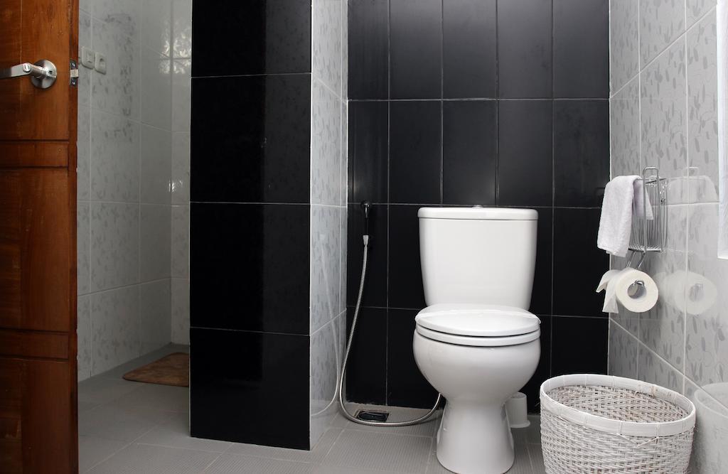 Taco Corner Apartment กีลีตราวางัน ห้อง รูปภาพ